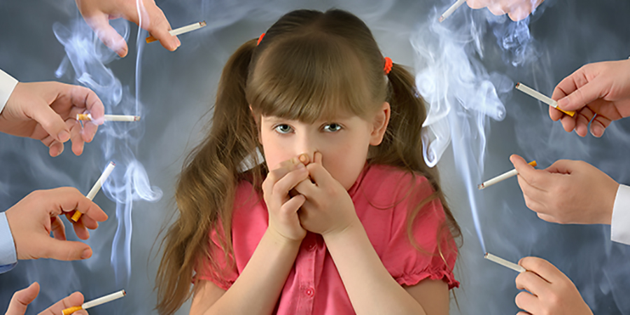 Child surrounded by smoke